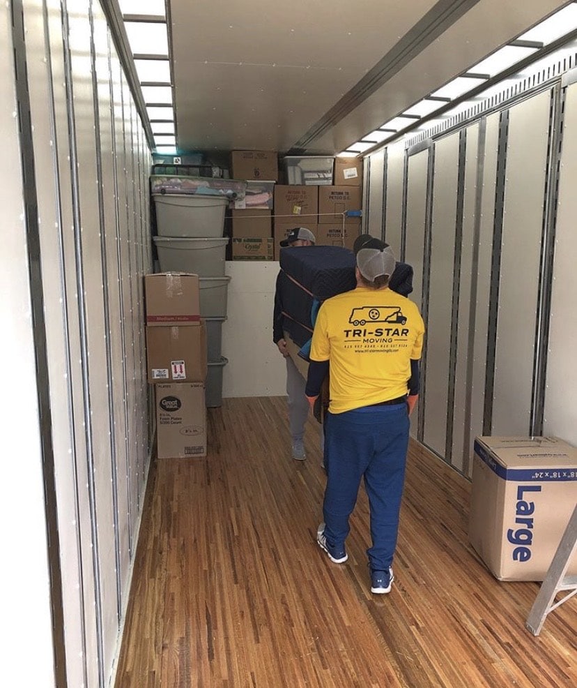 Tri-Star Movers packing truck for move